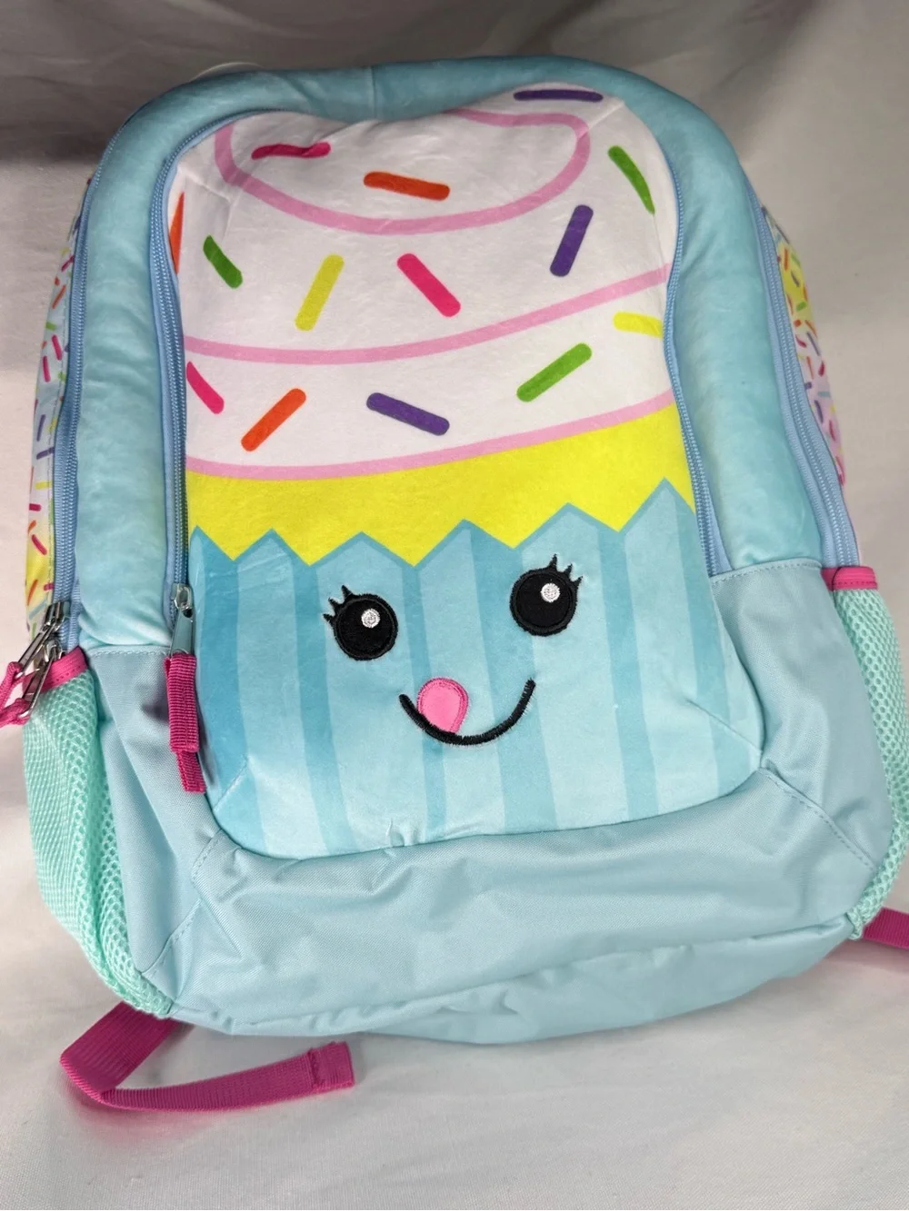 Libbey Light Blue Cupcake Backpack with Multicolor Sprinkles